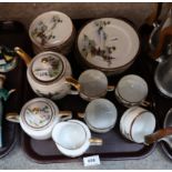 A Japanese eggshell tea service decorated with rural scenes Condition Report: Not available for this
