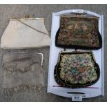 An assortment of lady's clutch bags, two embroidered, one chain example, one beaded Condition