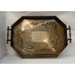 A large silver plated serving tray, rectangular with canted corner and twin applied handles on