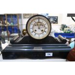A black slate mantle clock with drum head movement Condition Report: Available upon request