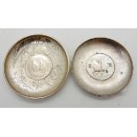 Two Chinese silver coin sets, dishes, the largest 9cm diameter, 115gms total Condition Report: