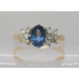 A 9ct blue gem and diamond ring, size L1/2, weight 2.5gms Condition Report: Available upon request