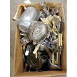 A box of picquot ware and loose cutlery Condition Report: Available upon request