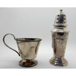 A lot comprising a silver sugar castor, 16.5cm high (weighted), rubbed Birmingham marks and a silver