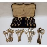 A lot comprising a cased set of twelve silver teaspoons (missing tongs), Birmingham 1915 with a