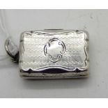 A silver vinaigrette by Frederick Marson, Birmingham 1858, with inner grille and engine, turned