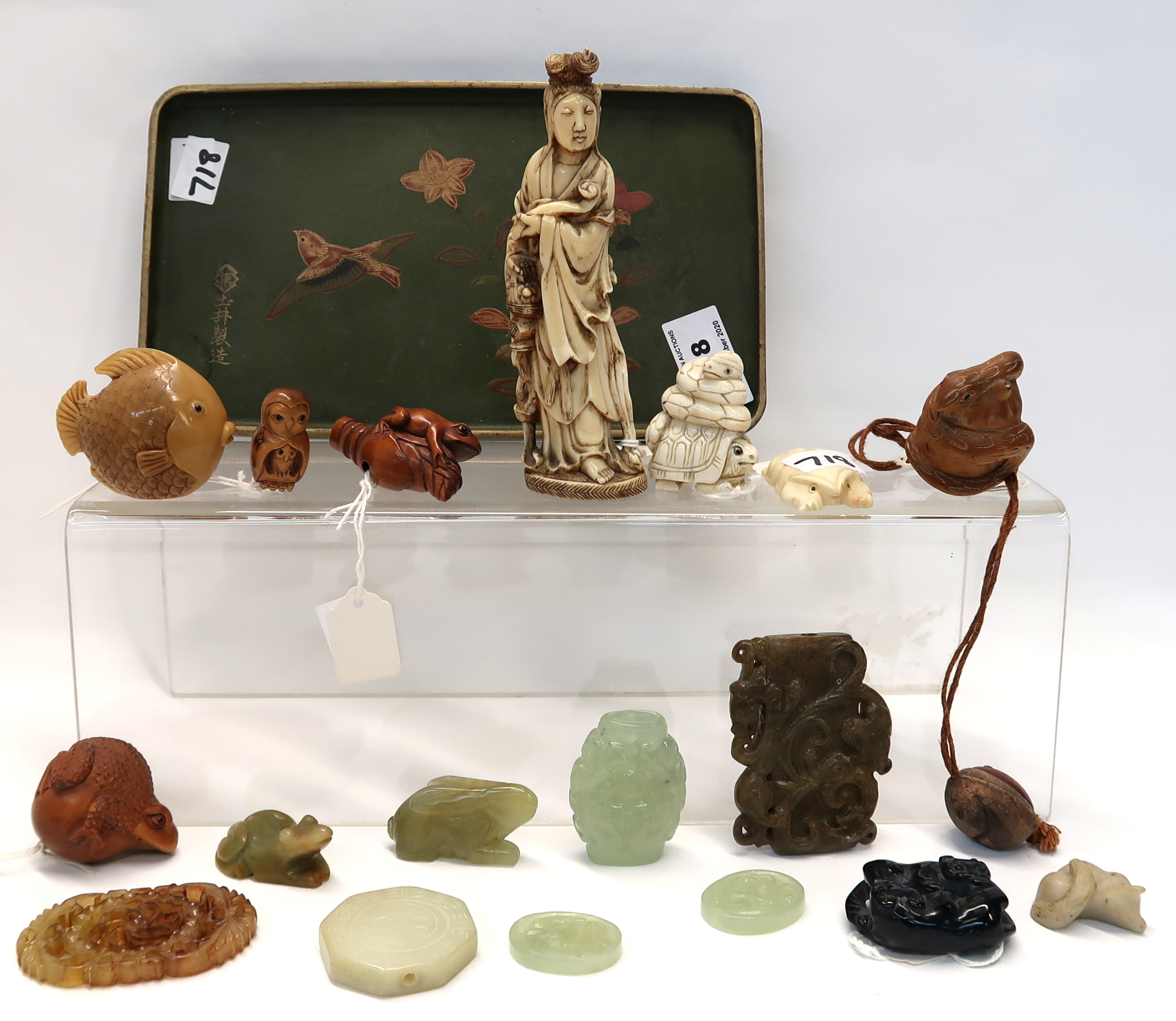 A collection of green hardstone and soapstone pieces, wooden netsukes, ivory figure etc Condition