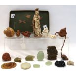 A collection of green hardstone and soapstone pieces, wooden netsukes, ivory figure etc Condition