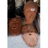 Two terracotta masks and one head Condition Report: Not available for this lot