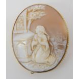 A yellow metal mounted large cameo brooch, dimensions 5.7cm x 4.7cm, weight 19.4gms Condition