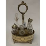 An EP six bottle cruet stand (two odd bottles) Condition Report: Available upon request