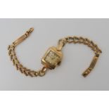 A 9ct gold ladies Helvetia vintage watch, weight including mechanism 12.2gms Condition Report: