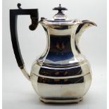 A silver hot water pot, Sheffield 1932, 23cm high, 679gms Condition Report: Available upon request