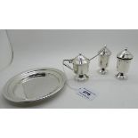 A three piece silver condiment set on stand, Birmingham 1921, 192gms Condition Report: Available