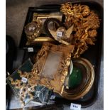 A lot comprising a selection of gilt frames and cherub ornaments Condition Report: Not available for