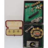A collection of vintage brooches to include one with an enamel bee and other items Condition Report: