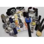 A childs Flik Flak divers watch, A Davidoff Cool water branded watch, a Swatch watch and other items