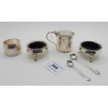 A lot comprising a pair of silver salts, Chester 1898, a silver mustard pot, Birmingham 1912 and a