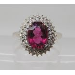 An 18ct white gold rubellite and diamond ring set with estimated approx 0.35cts of brilliant cut