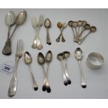 A mixed lot of assorted spoons and a silver napkin ring, 435gms Condition Report: Available upon