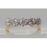 An 18ct gold five stone diamond ring set with estimated approx 0.70cts of brilliant cut diamonds,