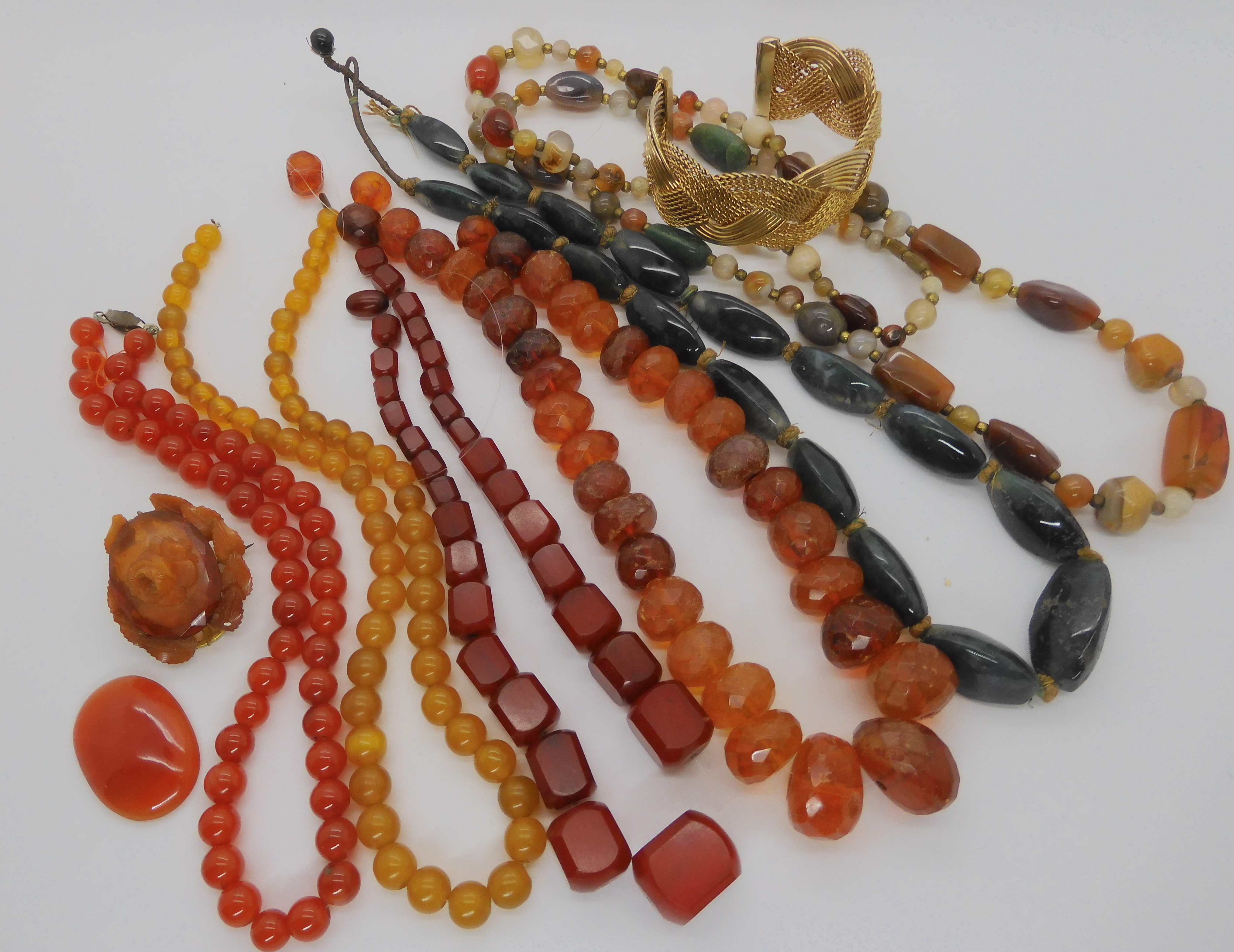 Amber beads, carnelian and other agate beads, vintage beads etc Condition Report: Not available