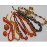 Amber beads, carnelian and other agate beads, vintage beads etc Condition Report: Not available