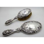 A silver backed brush and mirror set, Chester 1902 Condition Report: Available upon request
