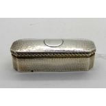 A hammered silver snuff box, Birmingham 1902, rectangular with canted corners, 8cm wide, 46gms