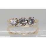 An 18ct three stone diamond ring set with estimated approx 0.70cts of brilliant cut diamonds, size