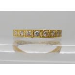 An 18ct gold diamond half eternity ring, size M1/2, set with estimated approx 0.20cts of brilliant