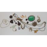 A collection of garnet set items, a white metal agate set brooch, a butterfly brooch and other items