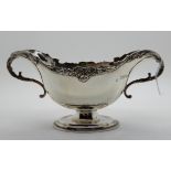 A silver doubled ended sauceboat, London 1899, 18cm across the handles, 169gms Condition Report:
