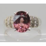 A 9ct white gold cinnamon quartz and white sapphire ring, size Q1/2, weight 4.1gms Condition Report: