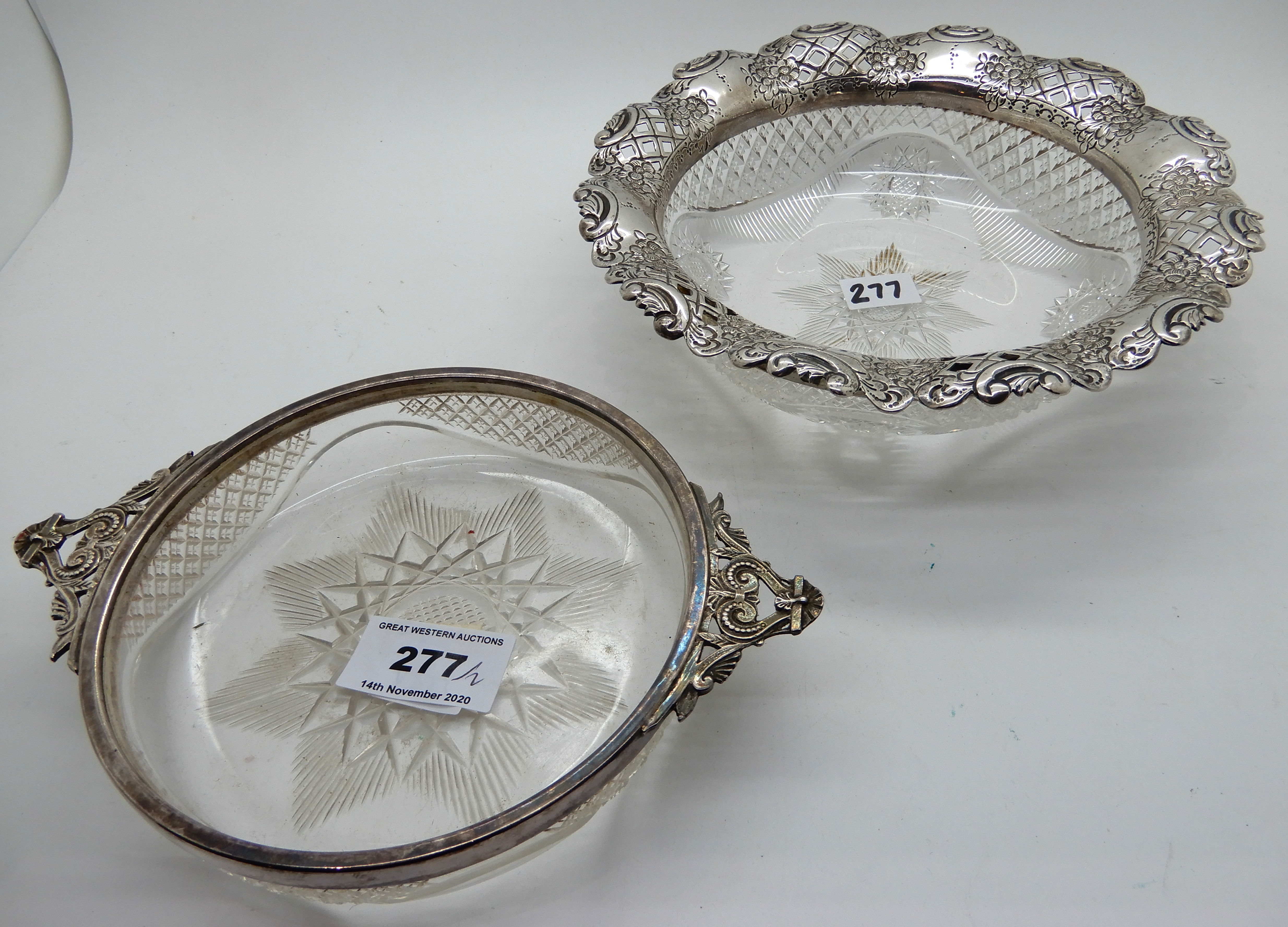 A lot comprising two silver mounted glass dishes, Sheffield 1913 and Birmingham 1898, the longest