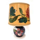 A Moorcroft anemone pattern table lamp with original shade Condition Report: Available upon request