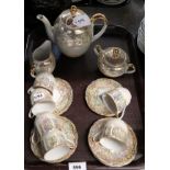 A continental coffee set with lustre decoration Condition Report: Not available for this lot
