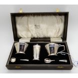 A cased three piece silver condiment set, Birmingham 1963 Condition Report: Available upon request