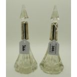 A pair of silver mounted cut glass scent bottles, Birmingham 1901, 20cm high Condition Report: