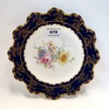 A Royal Crown Derby cabinet plate with painted flower decoration, 21.5cm diameter Condition