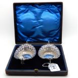 A cased pair of bon bon dishes, Sheffield 1906, oval with pierced decoration and twin scrolling
