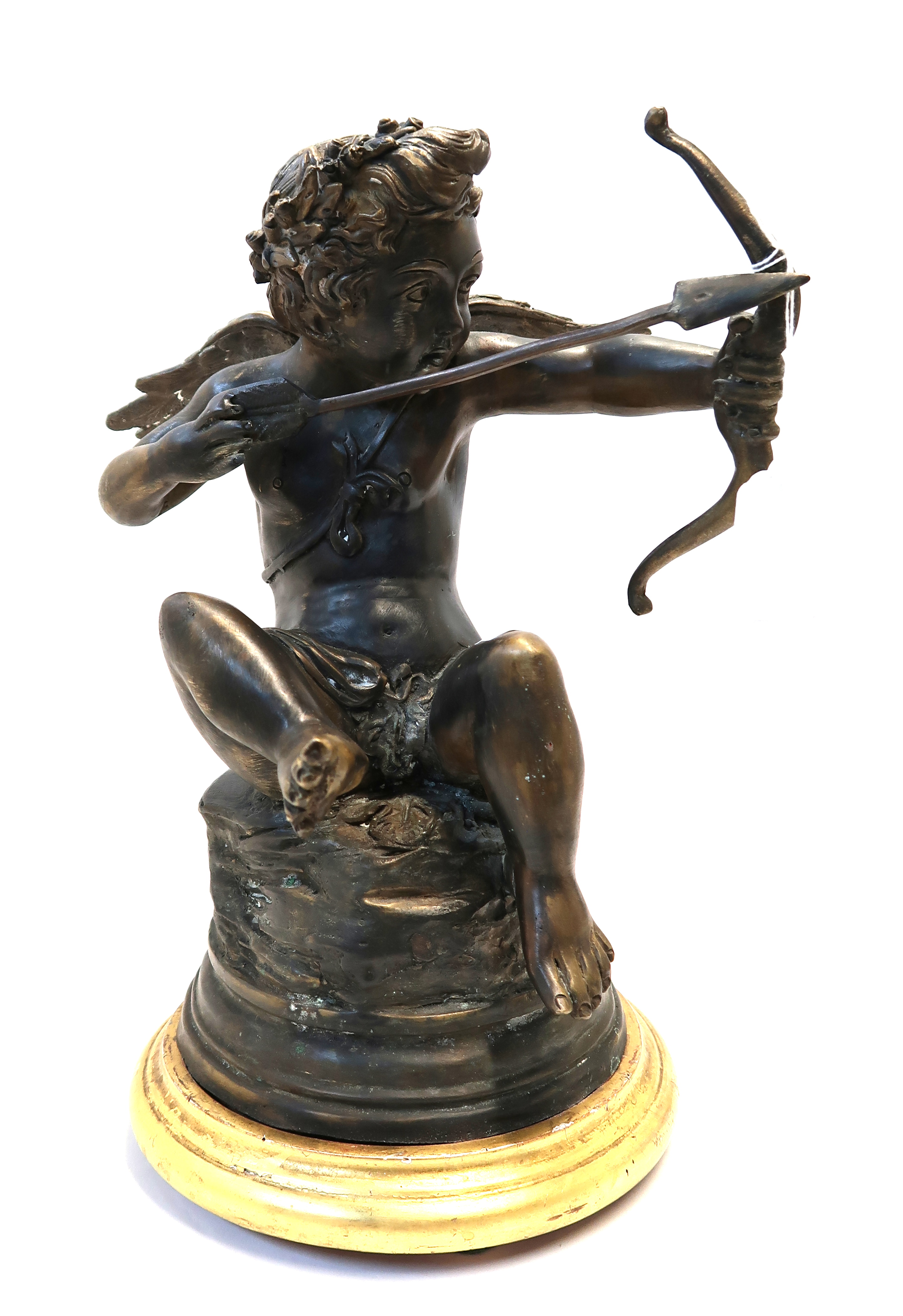 A bronze of a cherub, upon gilt plinth, 35cm high Condition Report: Available upon request