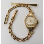 A 9ct gold ladies Certina wristwatch and a 9ct gold bar brooch, weight combined including