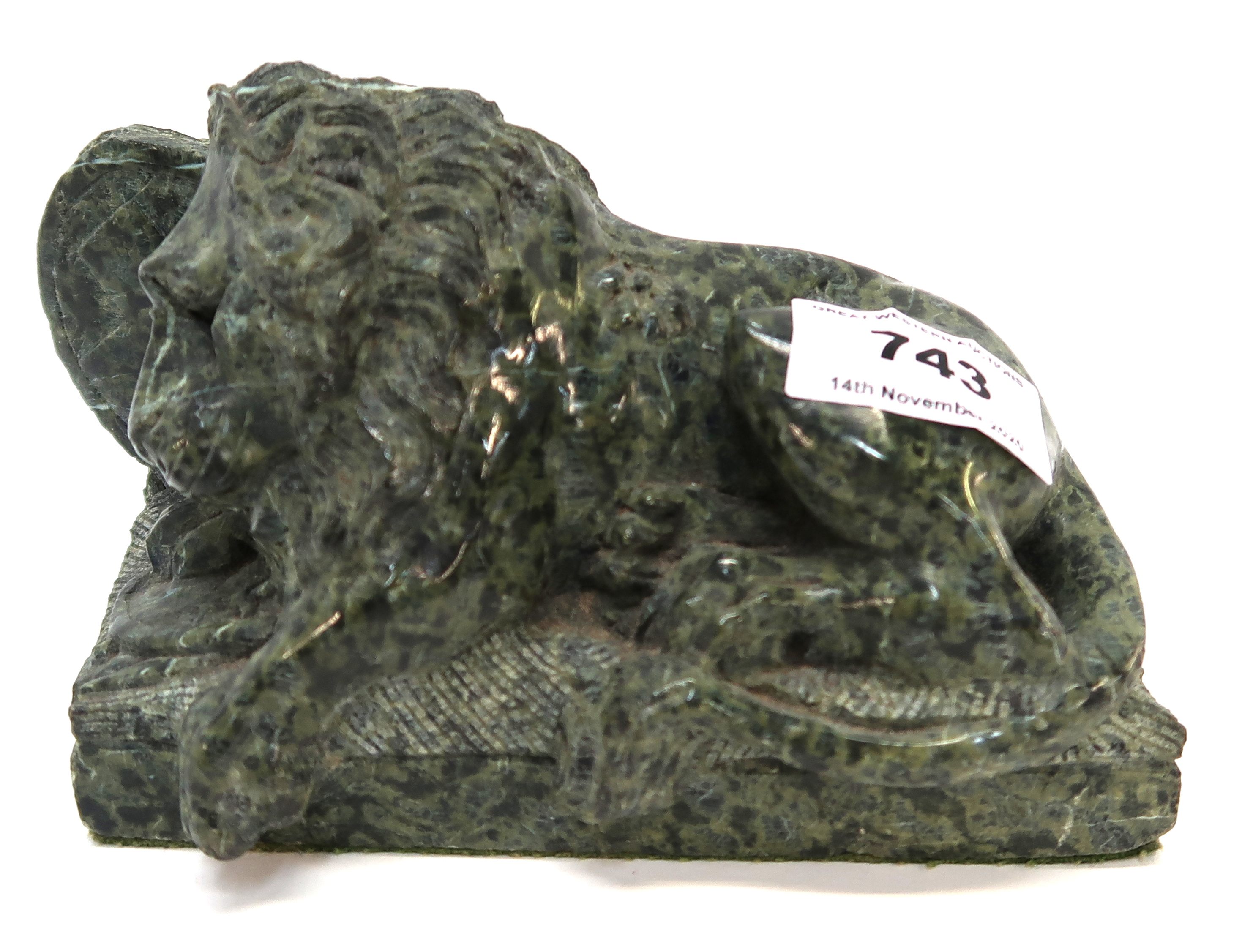 A serpentine stone model of the Lion of Lucerne Condition Report: Available upon request