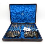 A cased set of twelve silver spoons with tongs, London 1884 Condition Report: Available upon