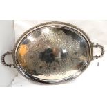 A silver plated serving tray with applied twin handles, 77cm across the handles Condition Report: