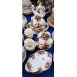 A Royal Albert Old Country Roses teaset with teapot, milk jug, sugar bowl, ten cups, six saucers,