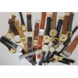 A collection of fashion watches to include Swatch, Iguzzini, double dialed watches etc Condition