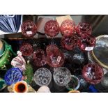 Eight ruby flashed and cut hock glasses, a pair of fern etched glasses and assorted other