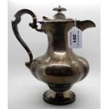 A silver hot water pot, Sheffield 1909, 24cm high, 636gms Condition Report: Available upon request